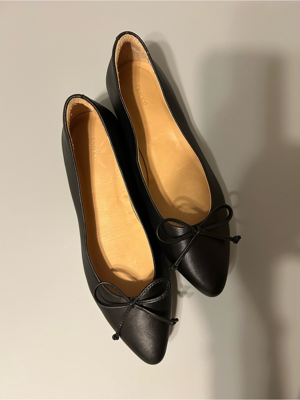 Quince Black Pointed Toe Ballet Flats with Bow Detail